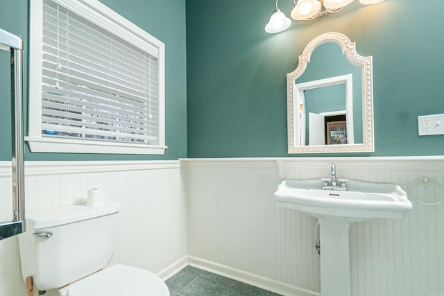 875 Ouachita 64, Camden, AR 71701 - half bath with tile patterned floors, toilet, and wainscoting