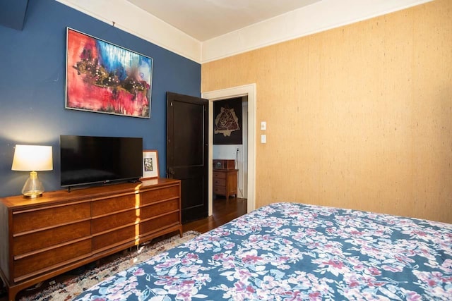 bedroom featuring wood finished floors