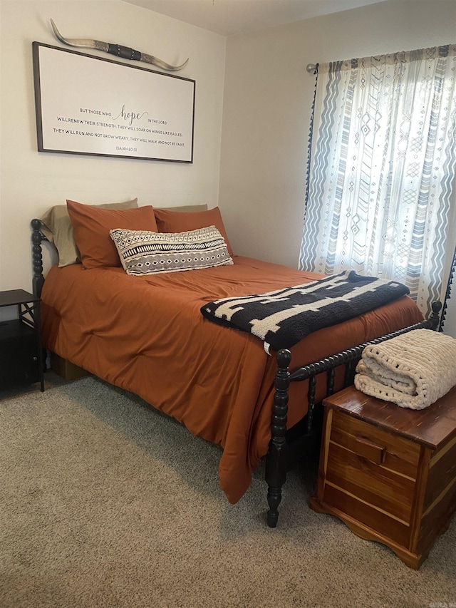 bedroom featuring carpet