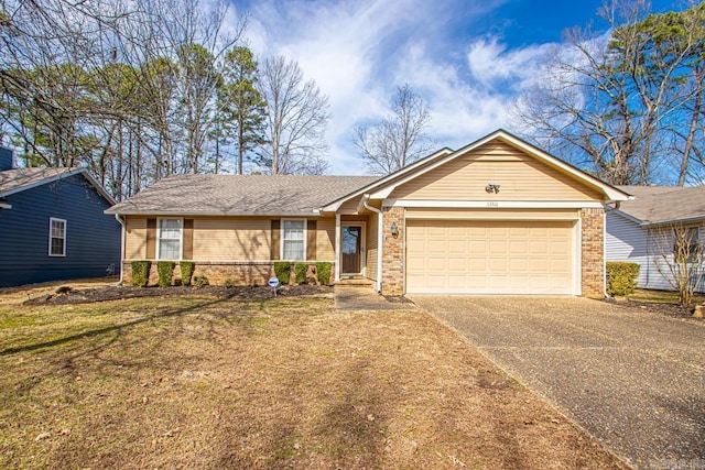 single story home with driveway, a shingled roof, an attached garage, a front lawn, and brick siding