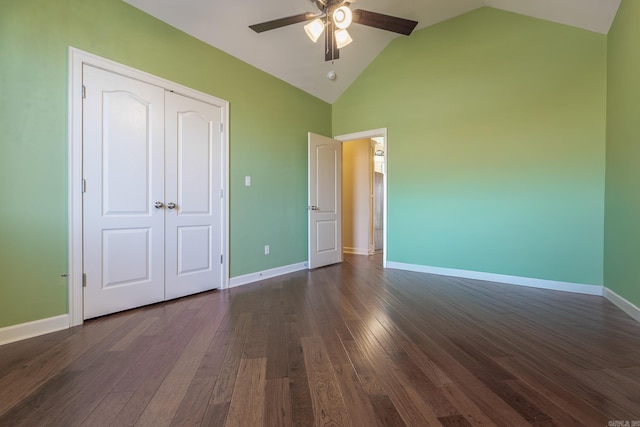 unfurnished bedroom featuring ceiling fan, high vaulted ceiling, dark wood-type flooring, and baseboards