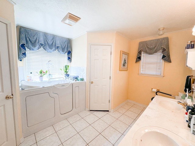 2407 Brittany, Searcy, AR 72143 - laundry room with washer and dryer, laundry area, a sink, and light tile patterned floors