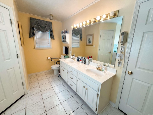 2407 Brittany, Searcy, AR 72143 - bathroom featuring crown molding, a sink, toilet, and double vanity