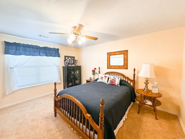 2407 Brittany, Searcy, AR 72143 - bedroom featuring a ceiling fan, carpet flooring, a textured ceiling, and baseboards