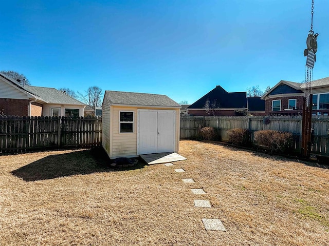 2407 Brittany, Searcy, AR 72143 - view of yard featuring an outbuilding, a fenced backyard, and a storage shed