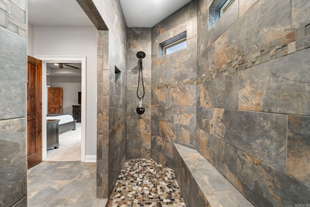 bathroom featuring a tile shower