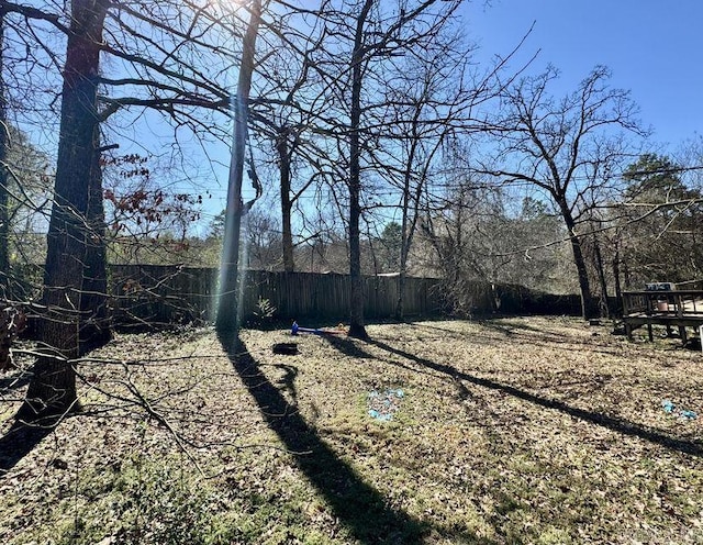 view of yard featuring fence