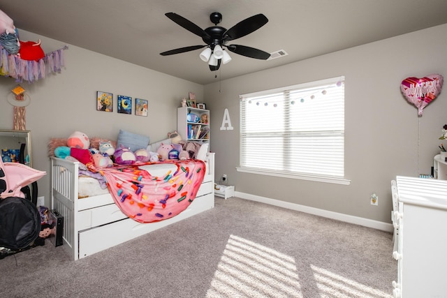 bedroom featuring carpet flooring, visible vents, ceiling fan, and baseboards