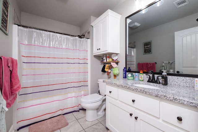 bathroom featuring curtained shower, visible vents, toilet, vanity, and tile patterned flooring