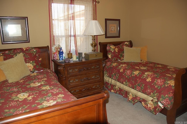 bedroom featuring carpet flooring