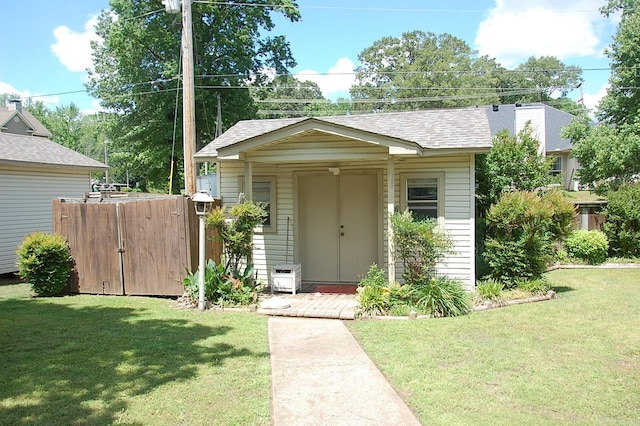 view of shed with fence