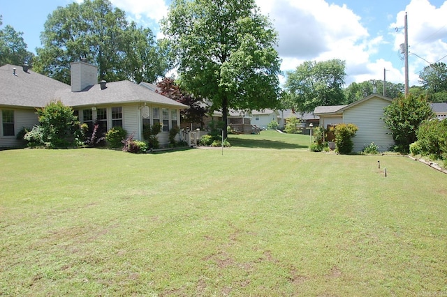 view of yard featuring an attached garage