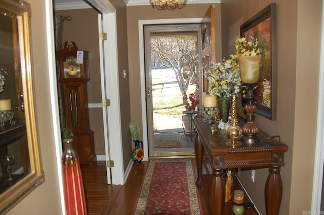 entryway featuring wood finished floors and baseboards