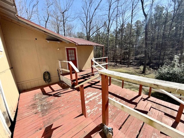 deck featuring a view of trees