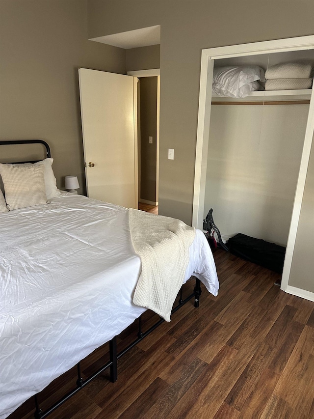 bedroom featuring a closet and wood finished floors