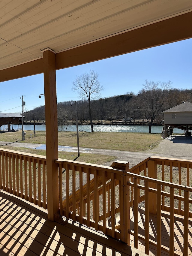 deck featuring a water view