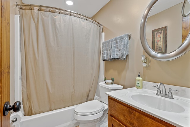 full bath featuring vanity, toilet, and shower / bathtub combination with curtain