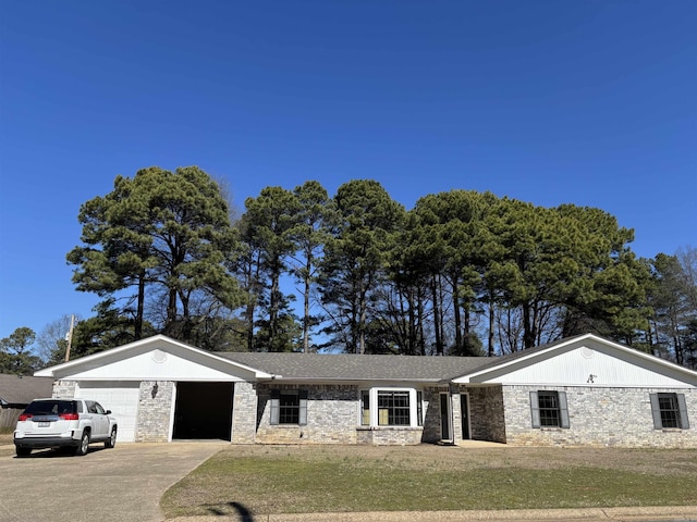 single story home featuring a garage, driveway, a front lawn, and a shingled roof