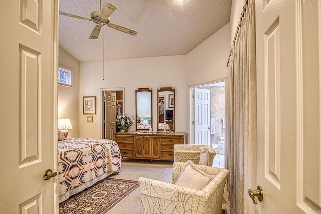 bedroom featuring a ceiling fan, access to outside, light colored carpet, and a textured ceiling