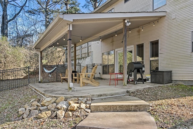 view of patio with fence