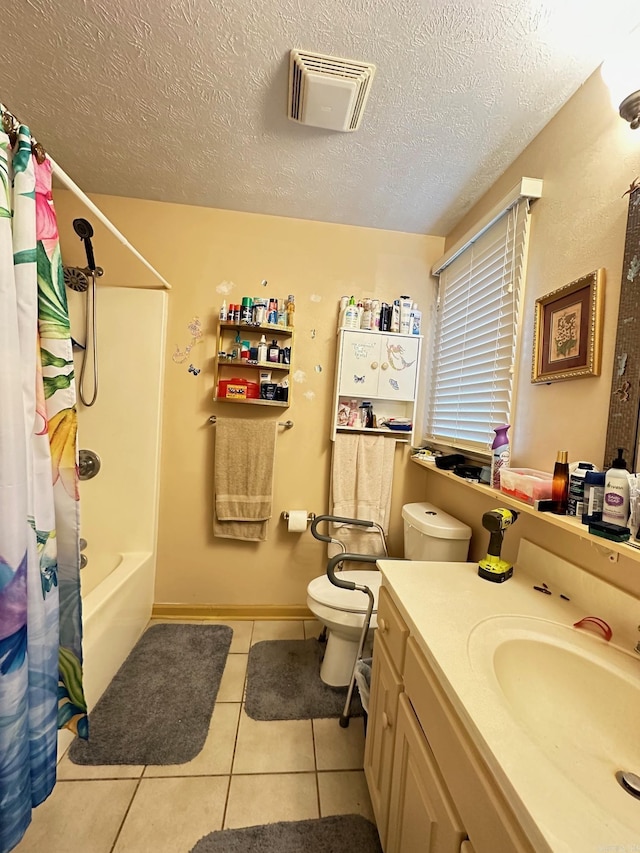 bathroom featuring shower / tub combo, visible vents, toilet, tile patterned flooring, and vanity