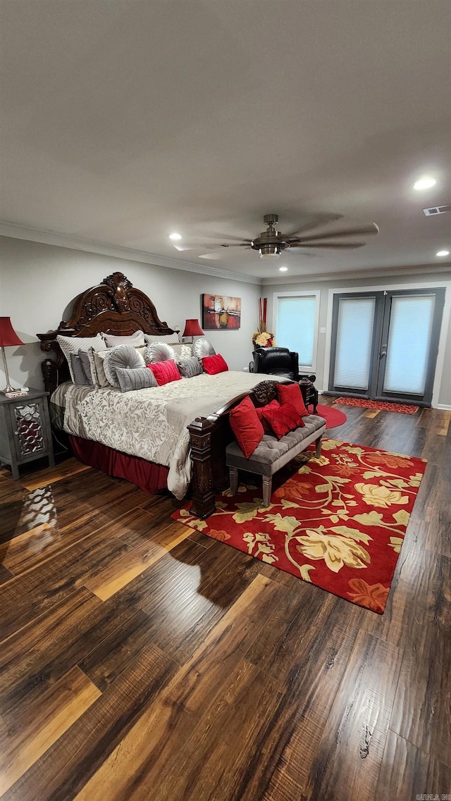 bedroom with hardwood / wood-style flooring, ceiling fan, visible vents, and recessed lighting