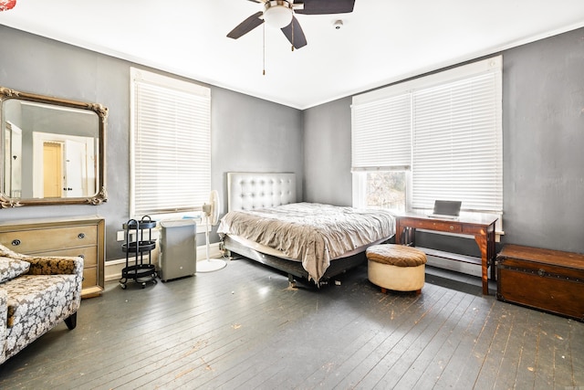 bedroom featuring ceiling fan and hardwood / wood-style floors