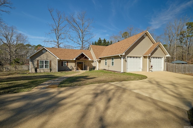 single story home featuring fence, driveway, and a front lawn