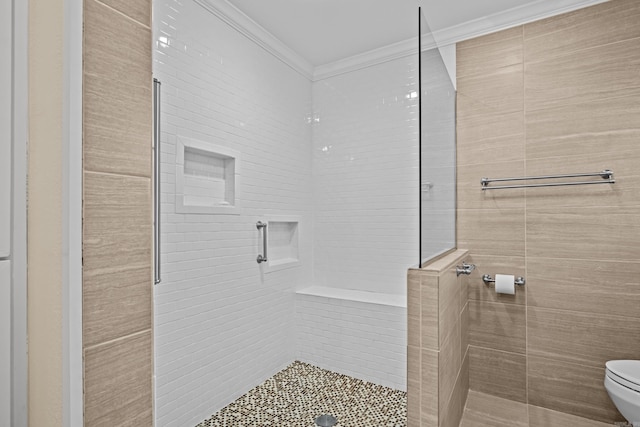 bathroom featuring walk in shower, toilet, and crown molding