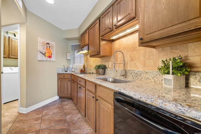 101 Long Island Dr Unit 202, Hot Springs National Park, AR 71913 - kitchen with washer / dryer, a sink, black appliances, and tasteful backsplash