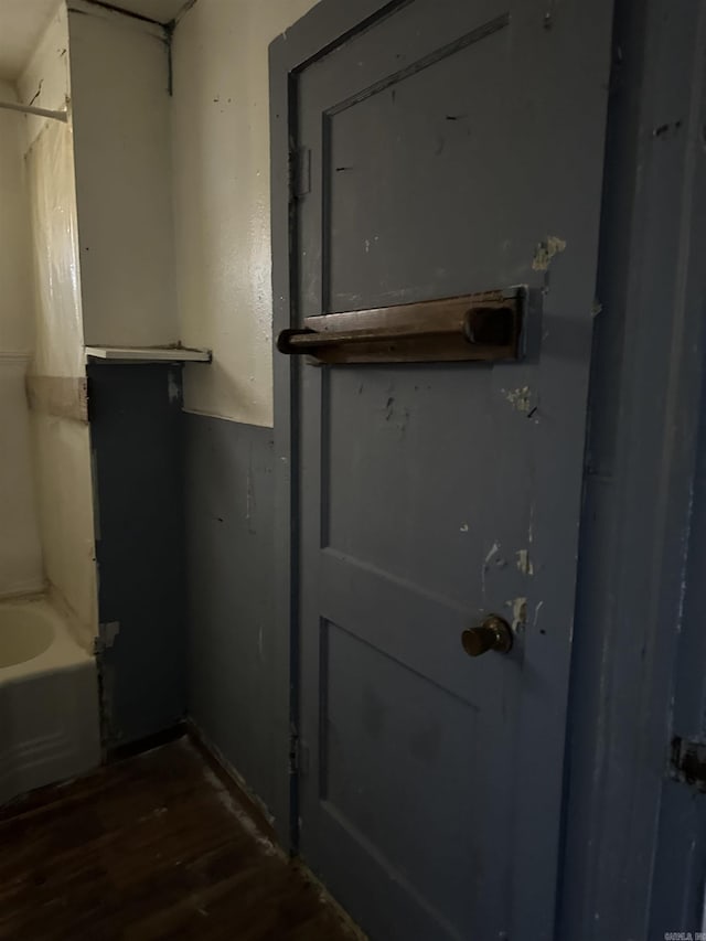 bathroom featuring wood finished floors