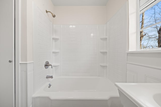 bathroom with shower / washtub combination