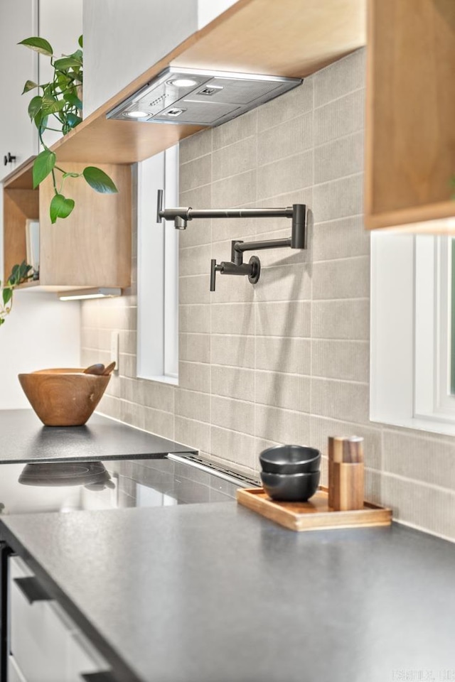 kitchen featuring tasteful backsplash