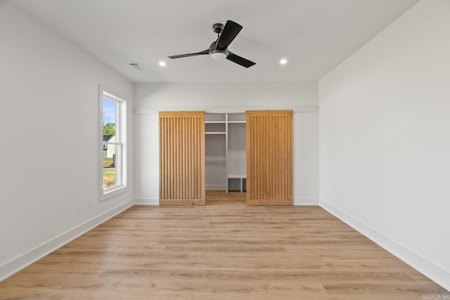 unfurnished bedroom with visible vents, baseboards, a ceiling fan, light wood-style flooring, and recessed lighting