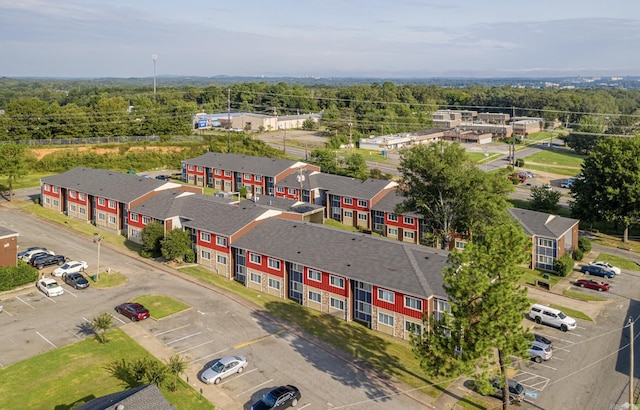 aerial view featuring a residential view and a view of trees