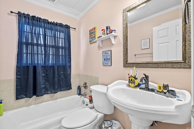 bathroom with a tub to relax in, a sink, crown molding, and toilet