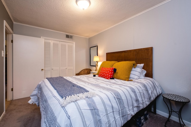 carpeted bedroom with ornamental molding, a closet, visible vents, and a textured ceiling