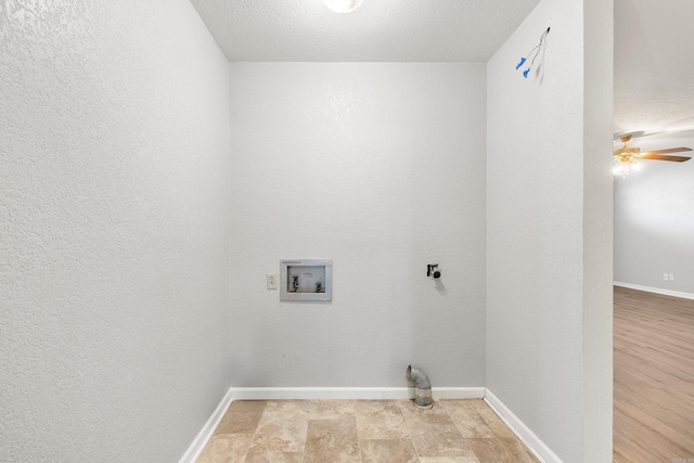 laundry room featuring washer hookup, a ceiling fan, a textured ceiling, laundry area, and baseboards