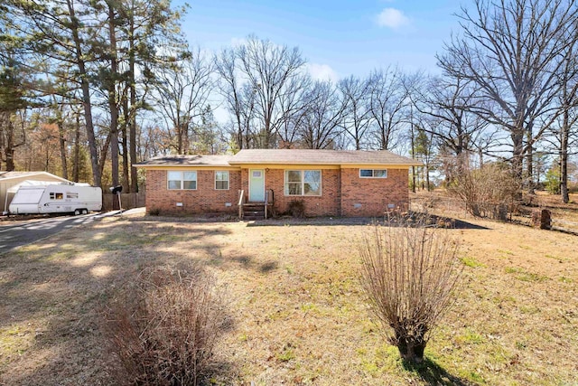 ranch-style home with crawl space and brick siding