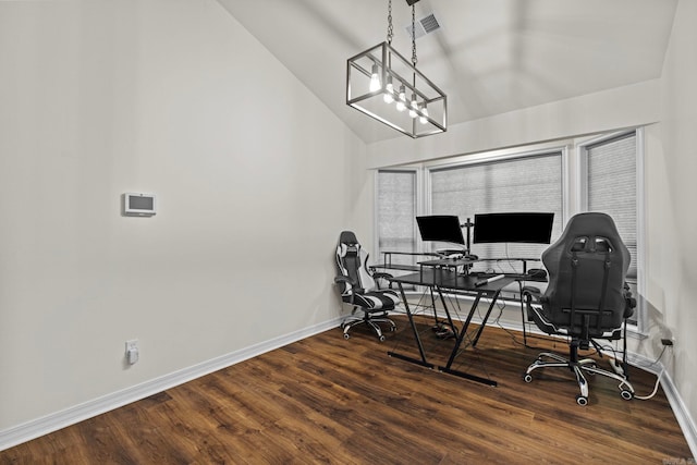 office with baseboards, vaulted ceiling, and wood finished floors