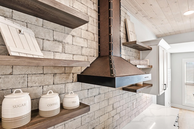 kitchen with wood ceiling, wood finished floors, and open shelves