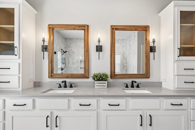 bathroom featuring double vanity and a sink