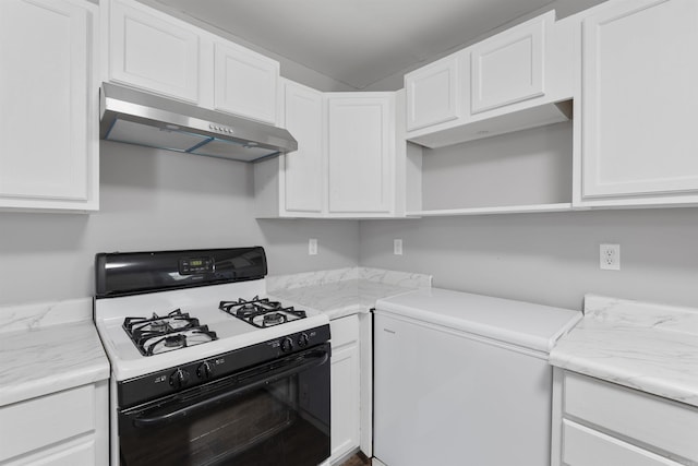 kitchen with white cabinets, gas range oven, white fridge, under cabinet range hood, and open shelves