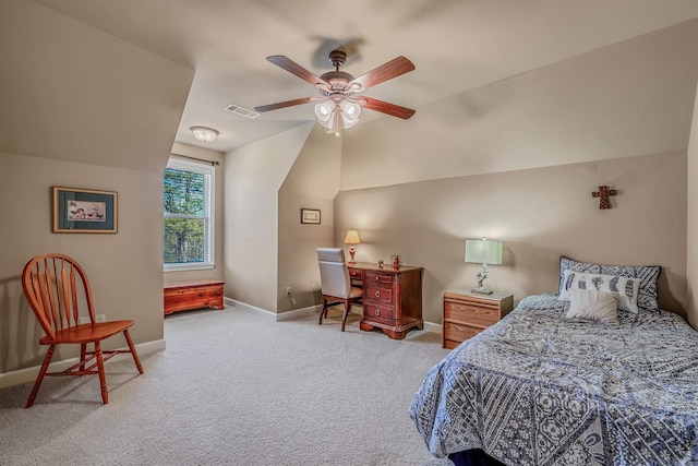 bedroom featuring carpet flooring, a ceiling fan, visible vents, vaulted ceiling, and baseboards