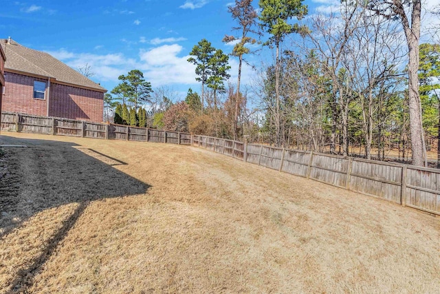 view of yard featuring a fenced backyard