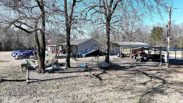 view of yard with a detached carport