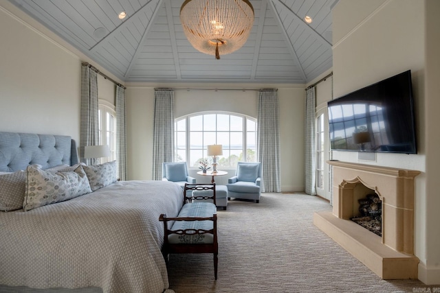 bedroom with a fireplace with raised hearth, carpet floors, wooden ceiling, and high vaulted ceiling