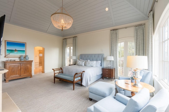 bedroom with arched walkways, vaulted ceiling, wooden ceiling, and carpet flooring