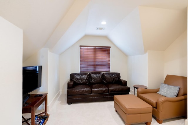 living area with vaulted ceiling, carpet, visible vents, and baseboards