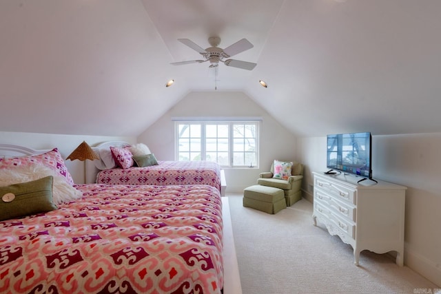 bedroom featuring lofted ceiling, ceiling fan, and carpet flooring